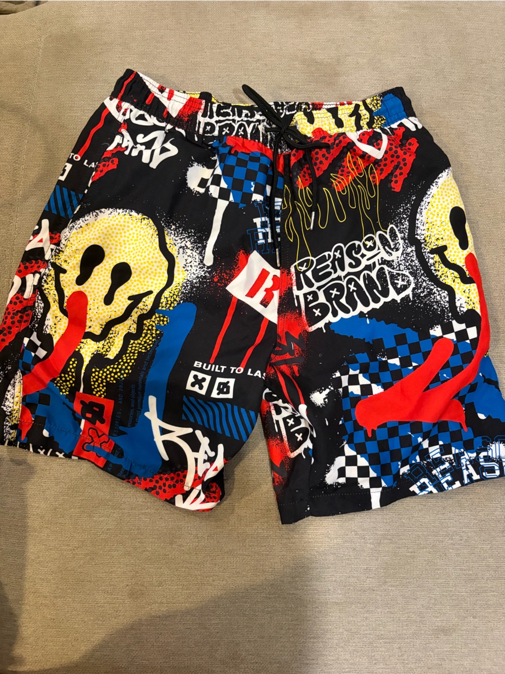 Reason Boys' Graphic Swim Shorts in Black, Red & Blue